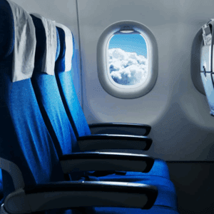 Empty plane seats and clouds